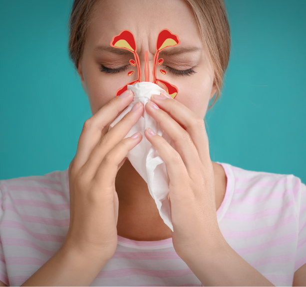 Sieviete notīra degunu ar salveti.